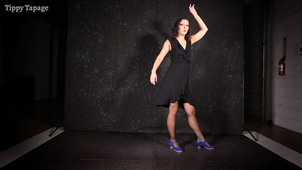 little black dress and blue shoes